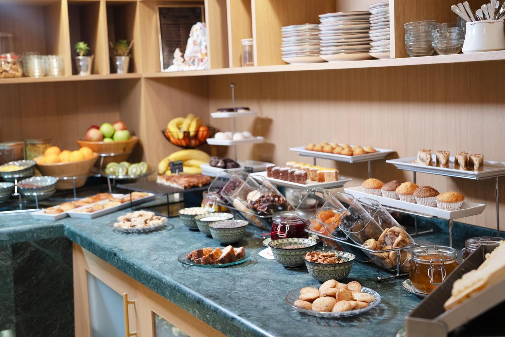 Maison Sofia - Mgallery Exterior photo A buffet at a hotel